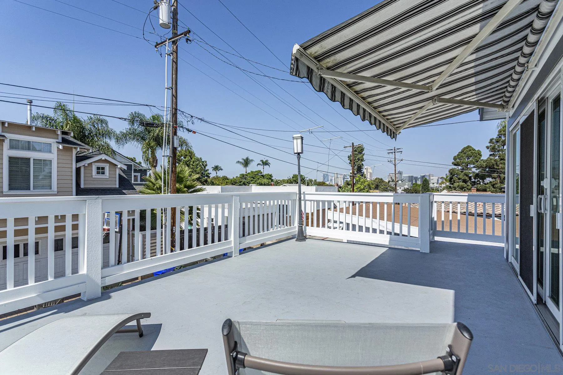 340 A Avenue Coronado, CA 92118 - Photo 41 of 41 a view of a chair and tables in the balcony