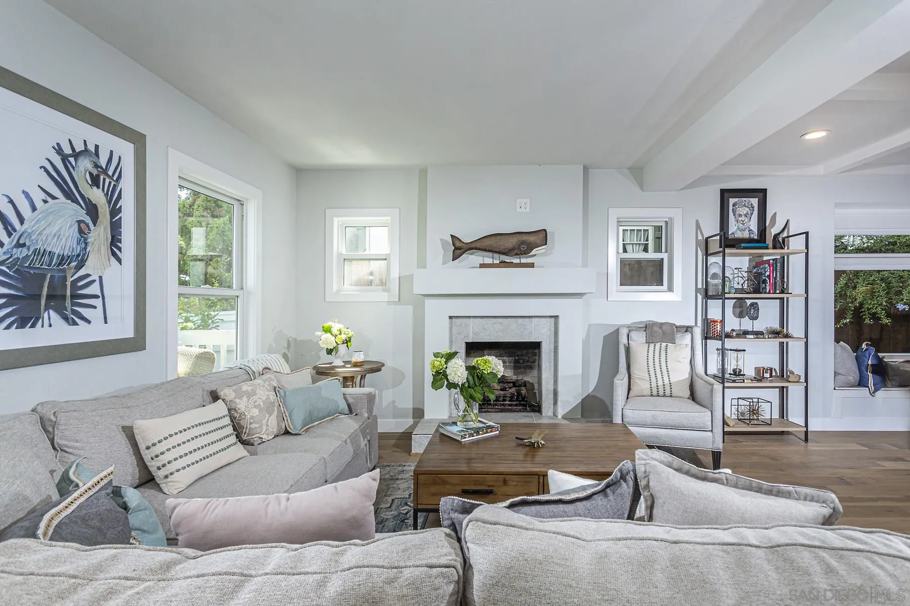 340 A Avenue Coronado, CA 92118 - Photo 7 of 41 a living room with furniture and a fireplace