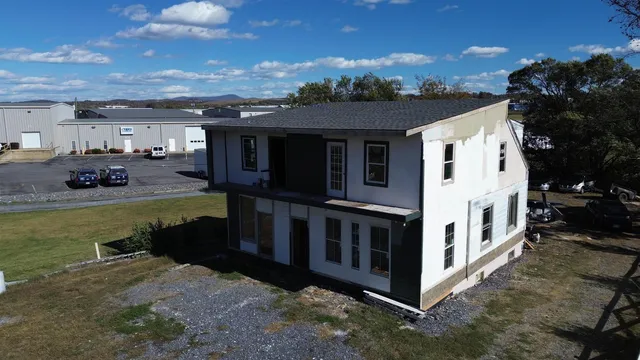 a view of a house with roof deck