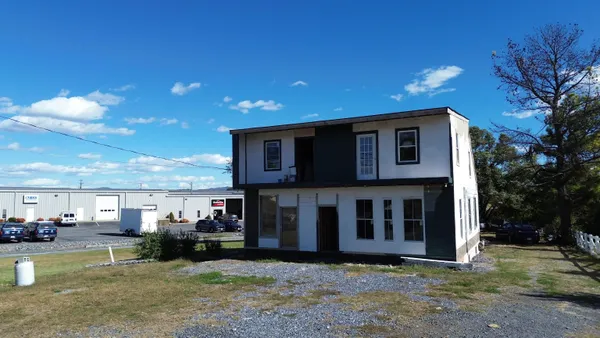 a view of a house with a patio