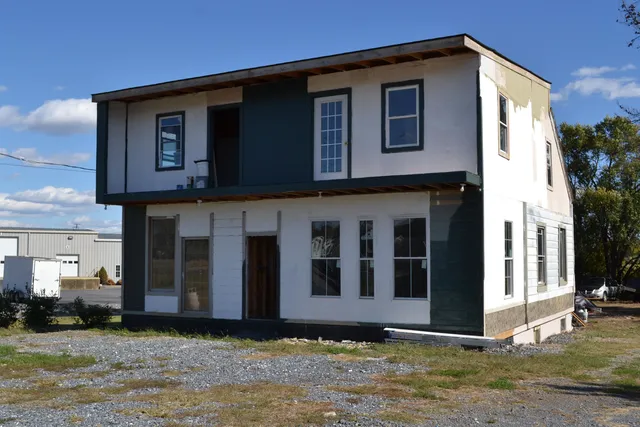 a house view with a garden space