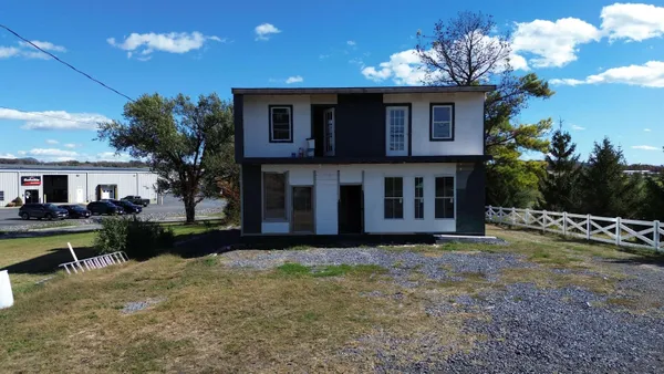 a view of a house with a patio