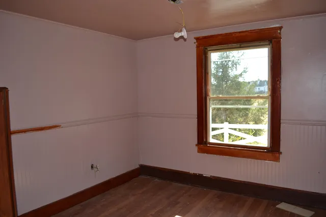 a room with furniture and a window