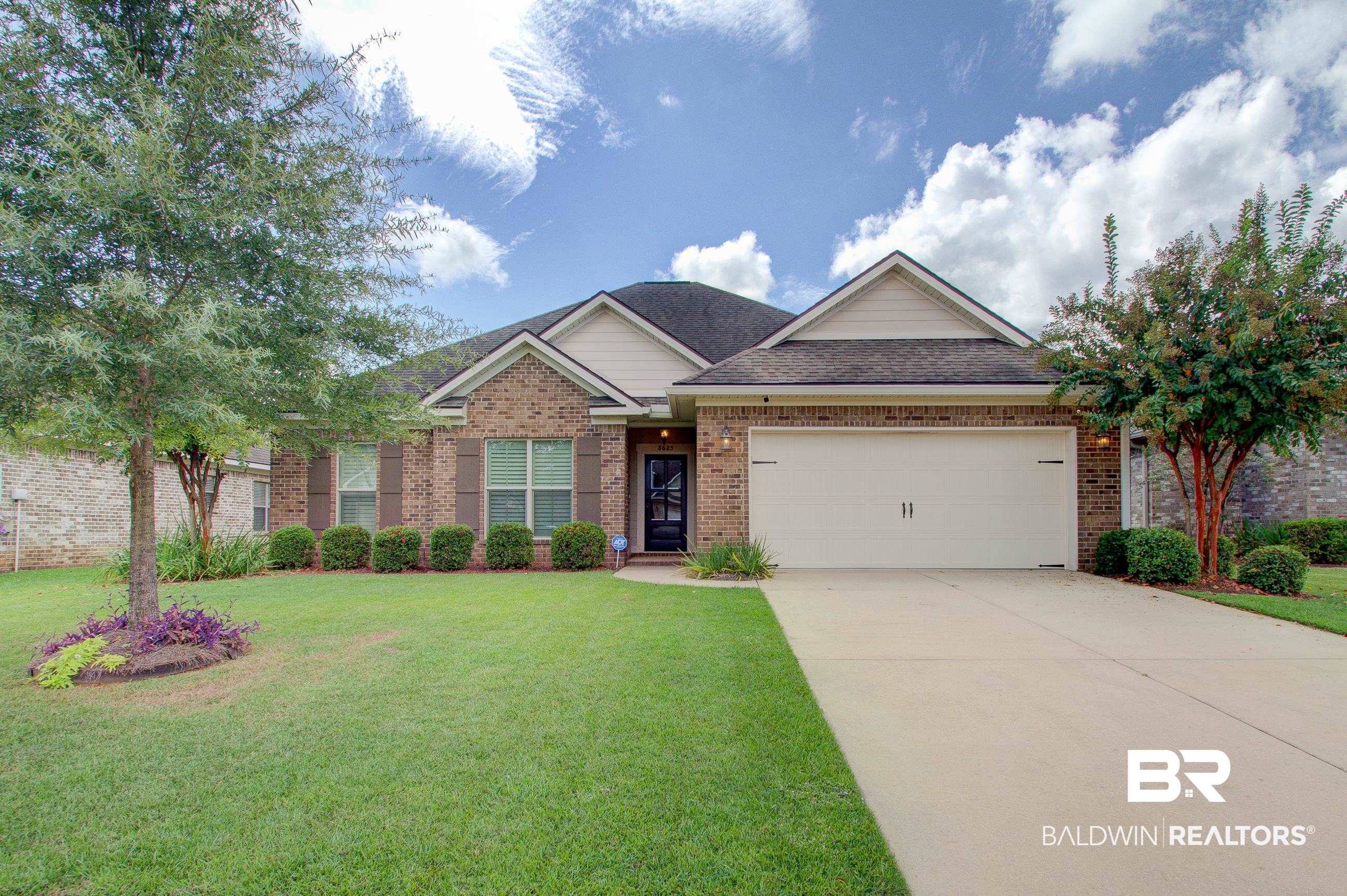 8625 Rosedown Lane Daphne, AL 36526 - Photo 1 of 29 View of front of home featuring a front lawn and a garage