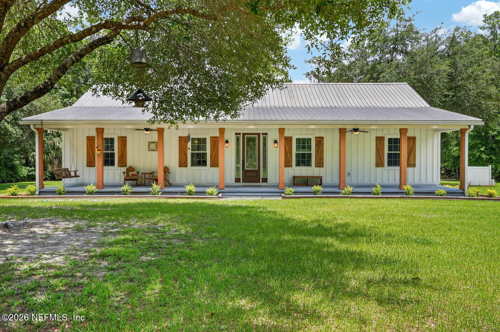 264 Peniel Church Road Palatka, FL 32177 - Photo 48 of 48 a front view of a house with a garden