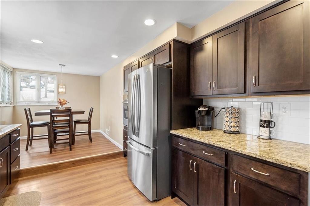 528 Loretto Road Pittsburgh, PA 15217 - Photo 11 of 39 A bonus to this kitchen is having two ovens. A wall oven is to the left of the refrigerator and an additional electric oven range is included as well.