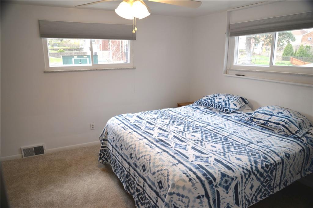528 Loretto Road Pittsburgh, PA 15217 - Photo 22 of 39 The specious master bedroom comfortably fits a king size bed. Brand new carpet in this spacious owners ensuite. Two windows filter in light on two sides and offer privacy as well.