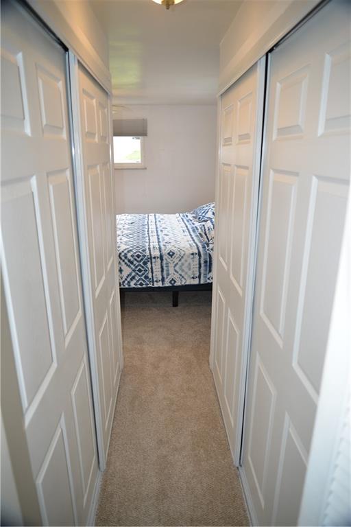 528 Loretto Road Pittsburgh, PA 15217 - Photo 24 of 39 A hallway from the master bedroom leads to the master bathroom. His and her large sliding closets are on both sides of the hallway.