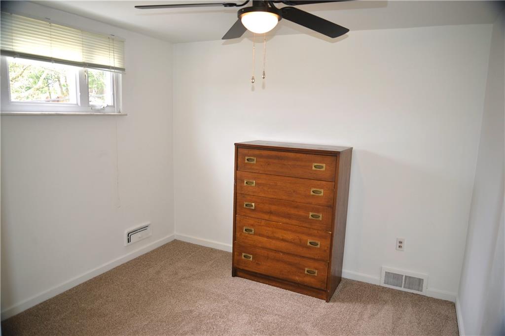 528 Loretto Road Pittsburgh, PA 15217 - Photo 30 of 39 Brand new carpet in this guest bedroom! All of the upstairs bedrooms have a ceiling fan/light combo allowing ample light year round.
