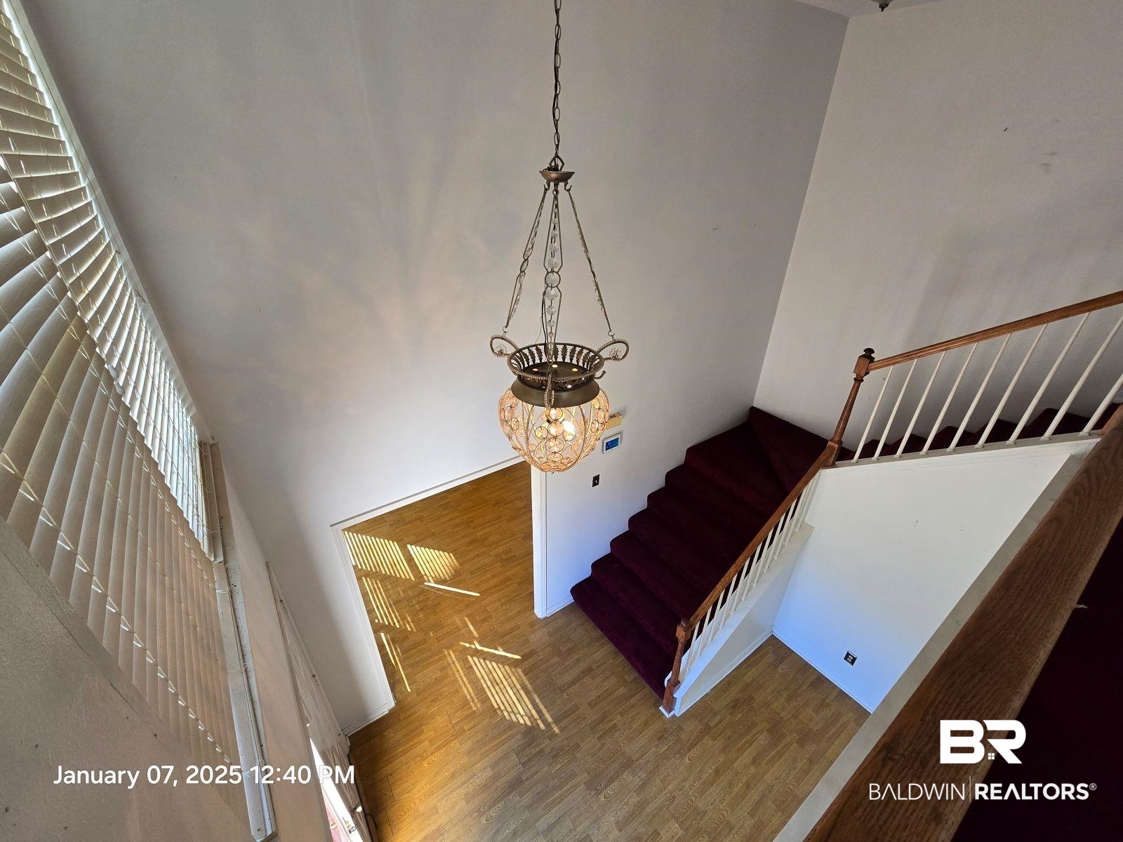154 Byrd Road Monroeville, AL 36460 - Photo 4 of 26 Stairs featuring hardwood / wood-style floors