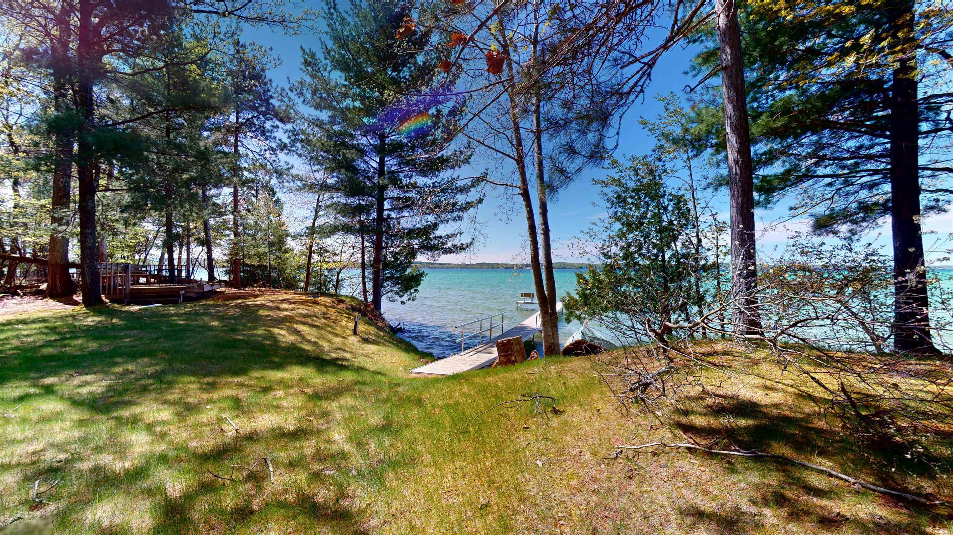 8645 Skegemog Point Road Williamsburg, MI 49690 - Photo 4 of 71