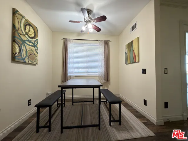 a view of a workspace with furniture