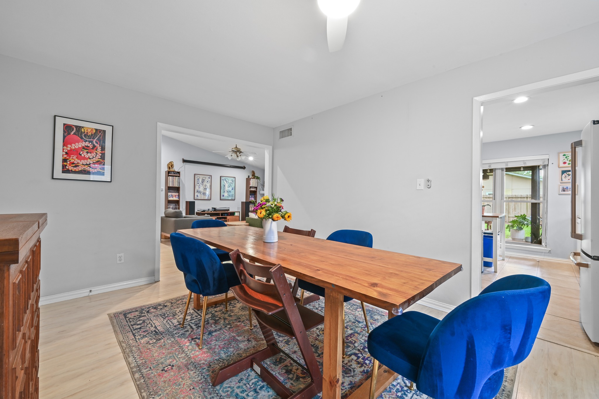 2509 Redleaf Lane Austin, TX 78745 - Photo 10 of 28 Dining area featuring light wood-finish flooring and a ceiling fan