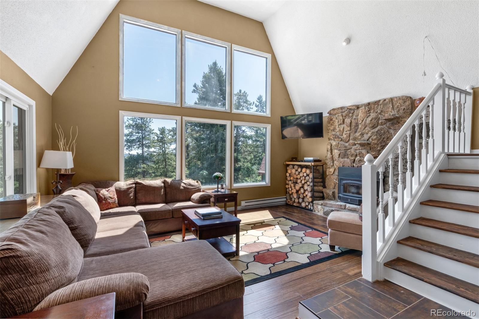 6637 High Drive Morrison, CO 80465 - Photo 4 of 28 a living room with furniture and a large window
