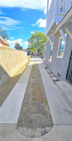 a view of a backyard of the house