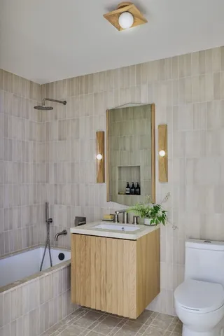 a bathroom with a toilet and a sink