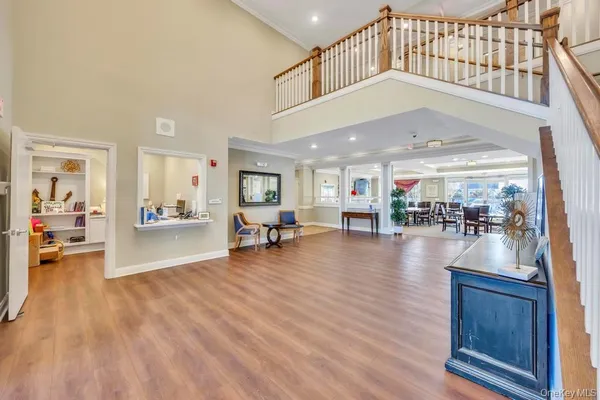 a view of entryway with wooden floor