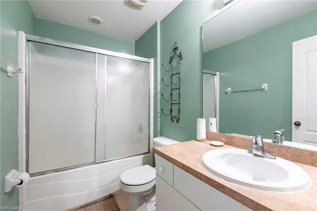 2900 8th Street Southwest Lehigh Acres, FL 33976 - Photo 24 of 32 a bathroom with a sink toilet and shower