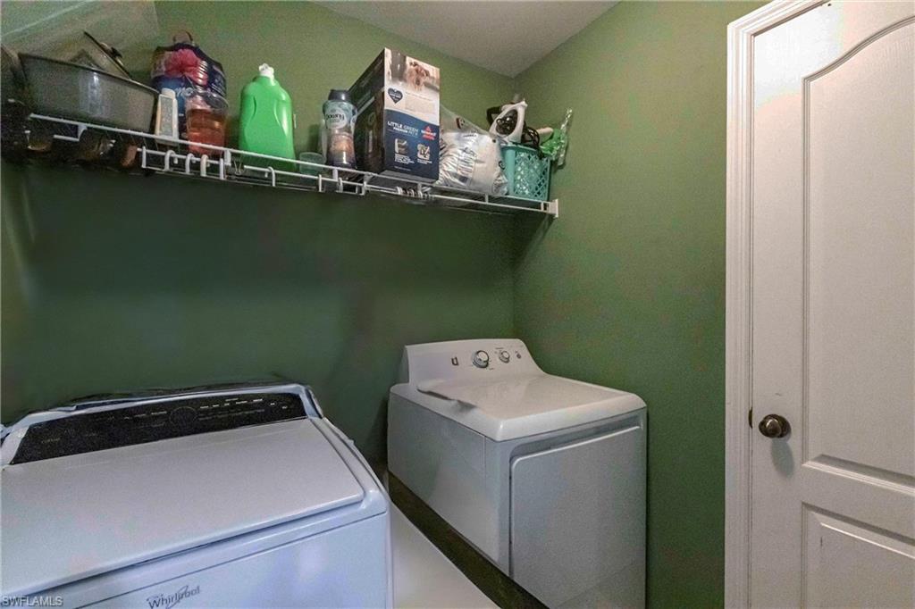 2900 8th Street Southwest Lehigh Acres, FL 33976 - Photo 25 of 32 a utility room with dryer and washer