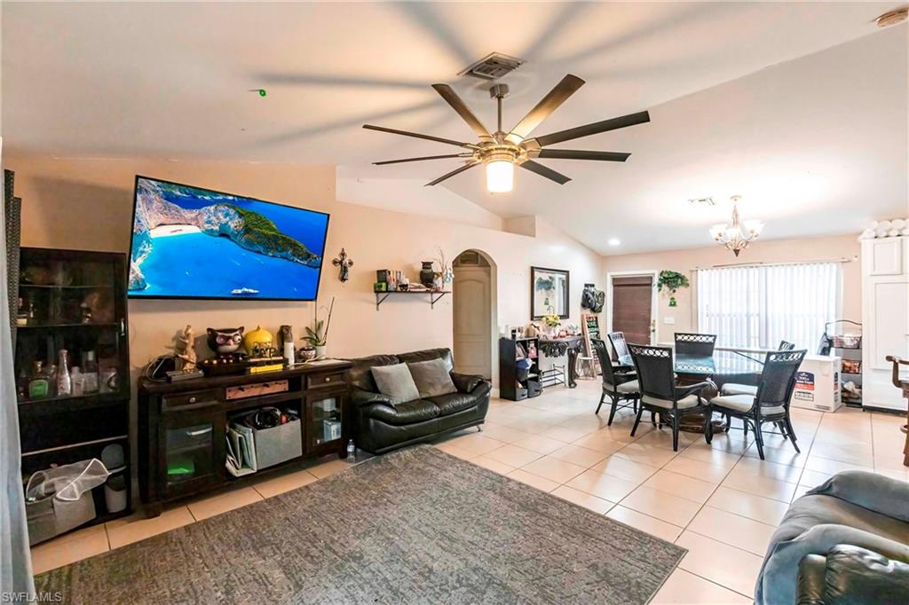 2900 8th Street Southwest Lehigh Acres, FL 33976 - Photo 7 of 32 a view of a livingroom and dining room