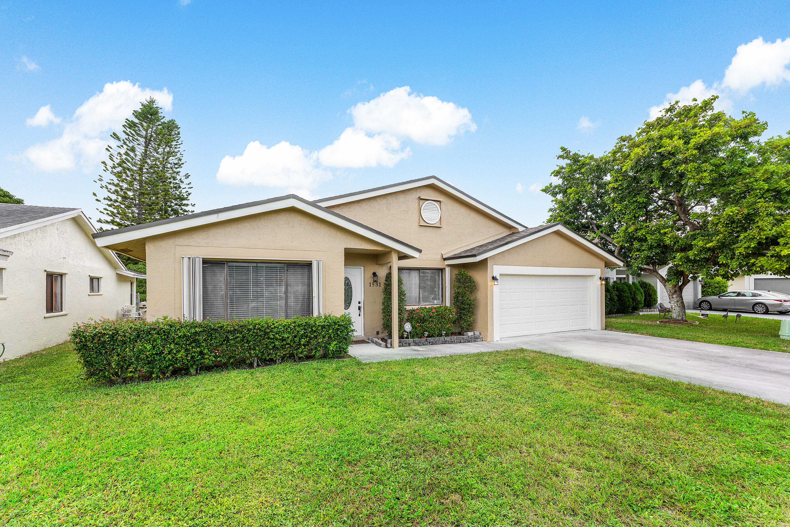 1531 Southwest 102nd Terrace Davie, FL 33324 - Photo 1 of 30 a front view of house with yard and green space