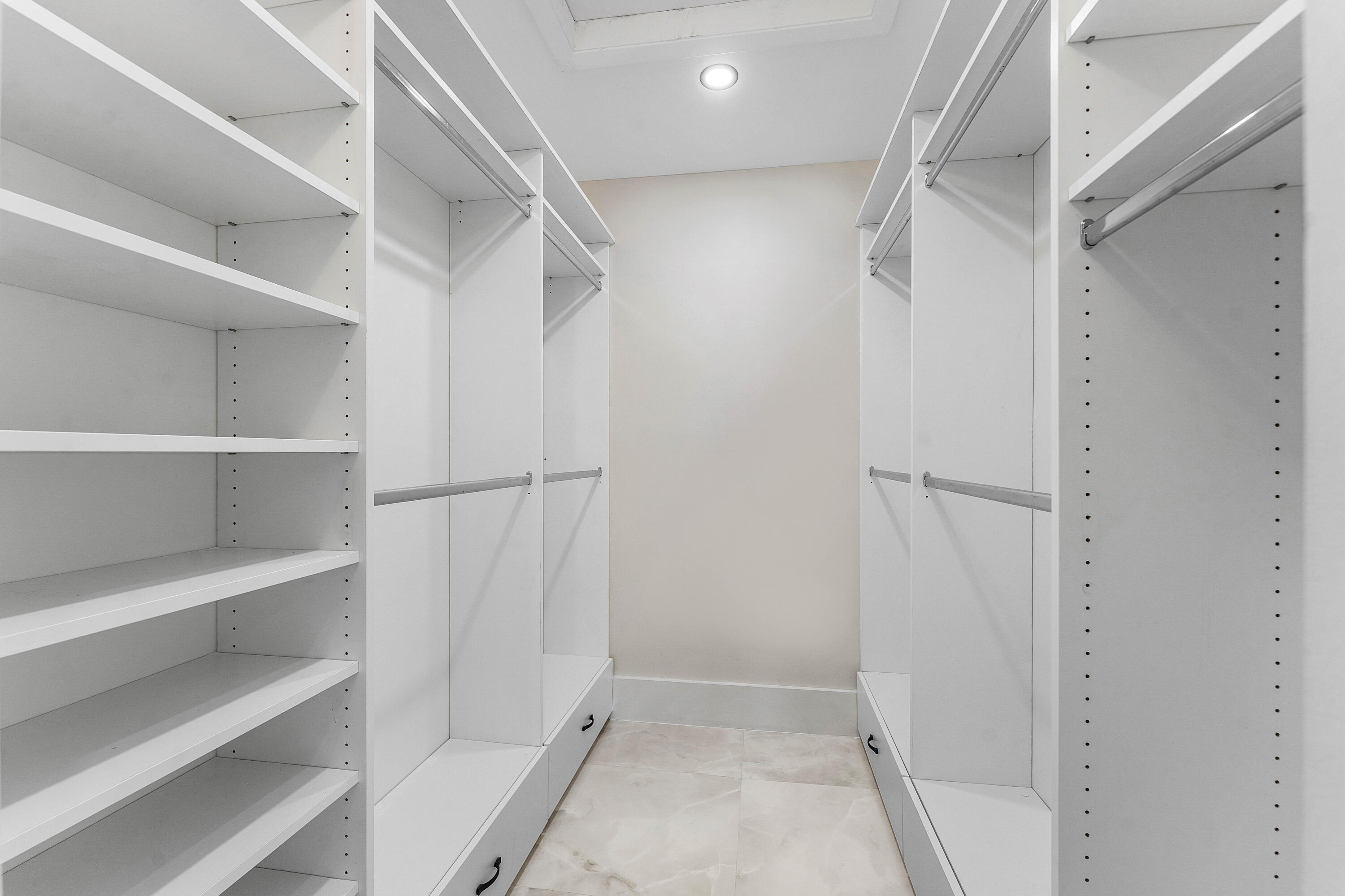 1531 Southwest 102nd Terrace Davie, FL 33324 - Photo 18 of 30 a view of walk in closet with empty racks