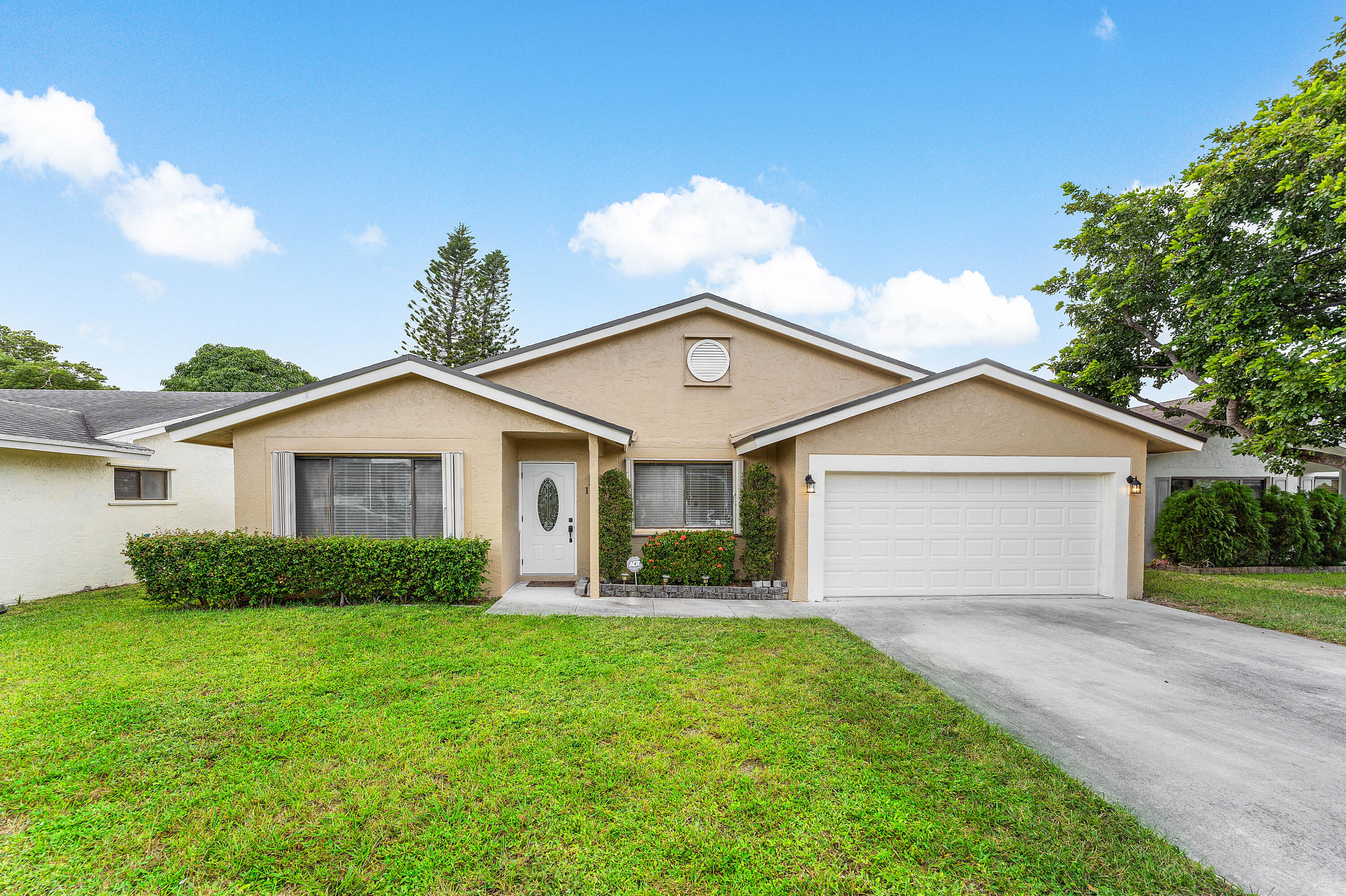 1531 Southwest 102nd Terrace Davie, FL 33324 - Photo 2 of 30 a front view of house with yard and green space