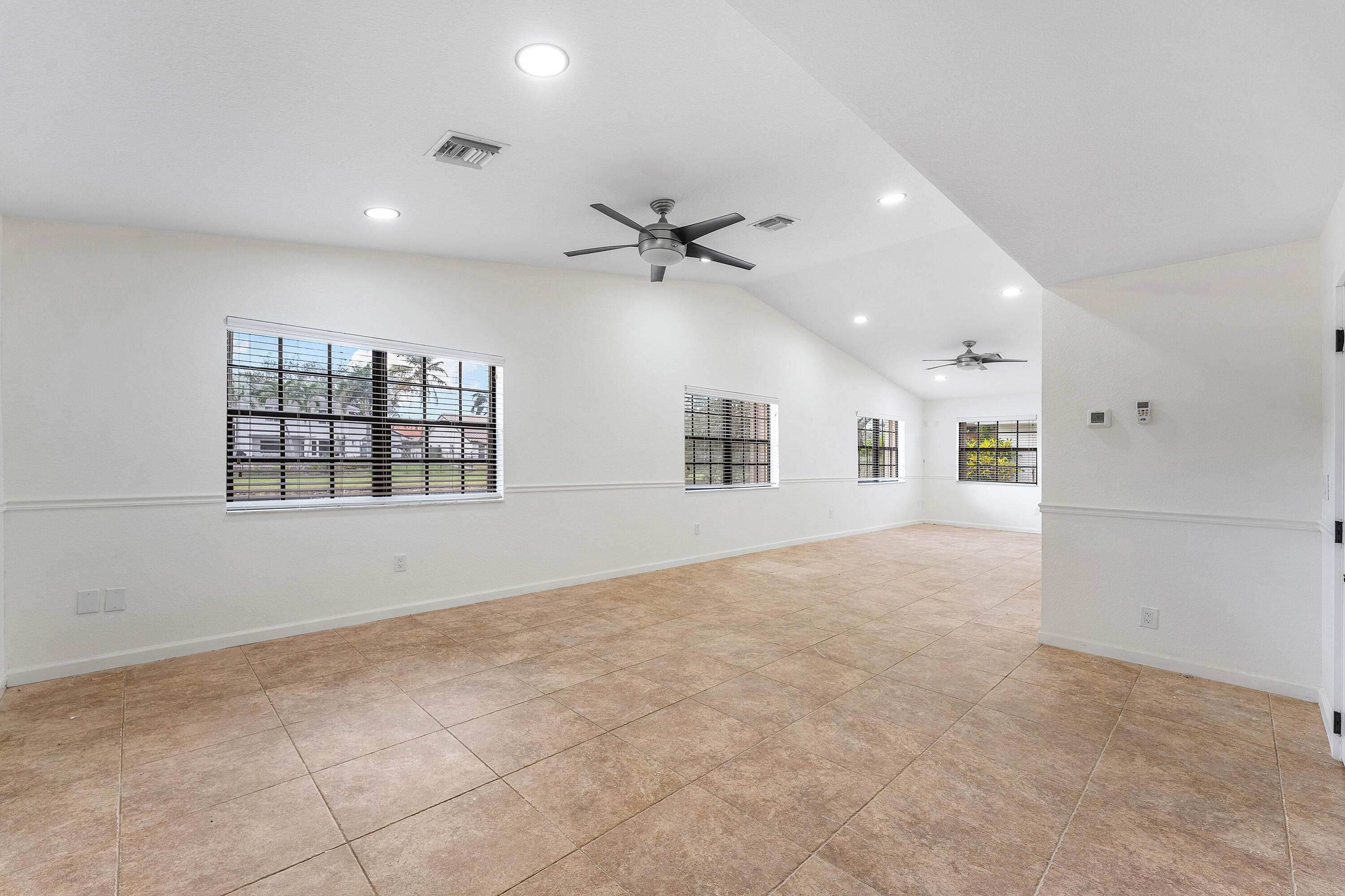 1531 Southwest 102nd Terrace Davie, FL 33324 - Photo 23 of 30 a view of an empty room with a window