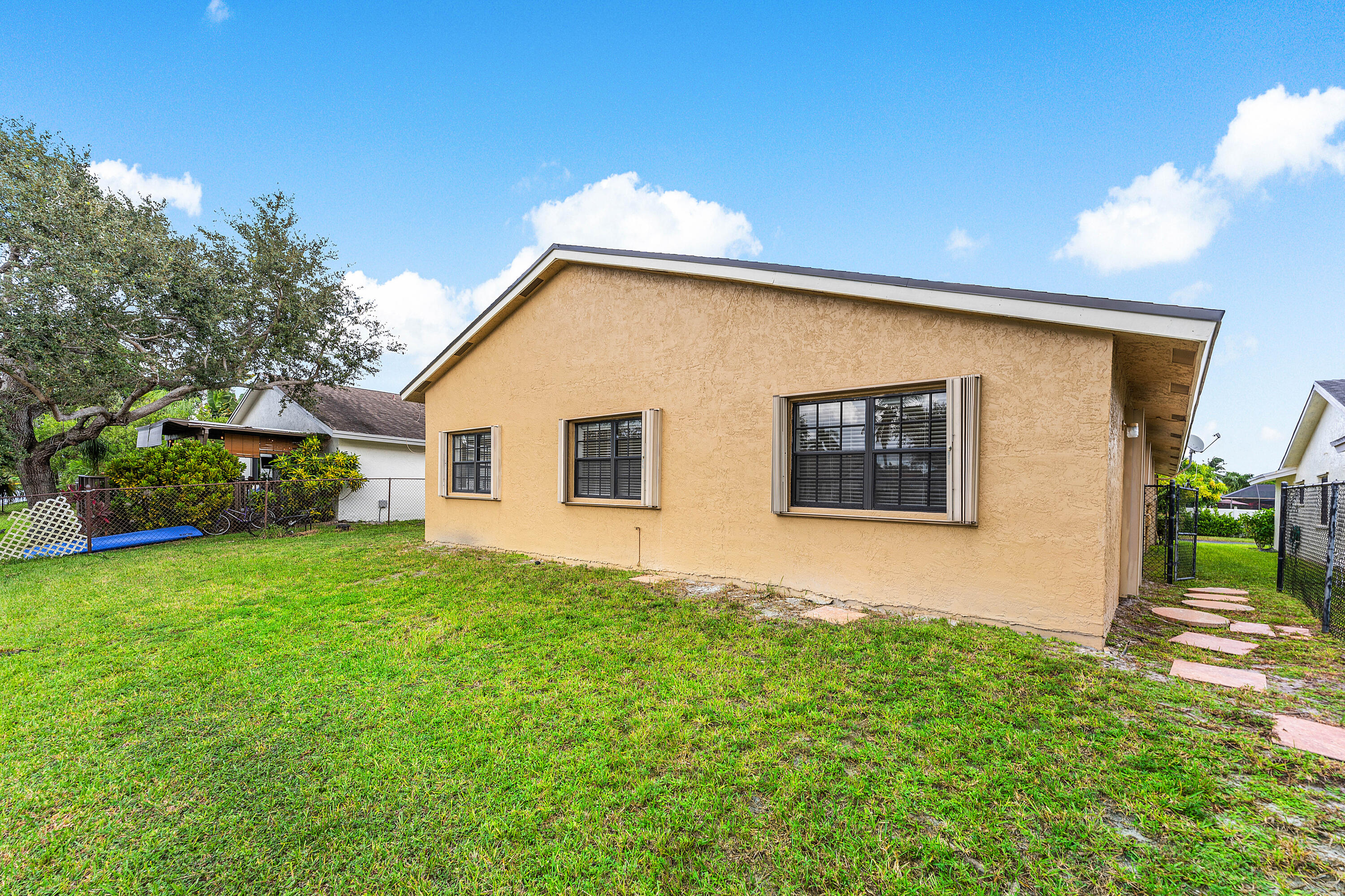 1531 Southwest 102nd Terrace Davie, FL 33324 - Photo 25 of 30 a view of a house with a yard