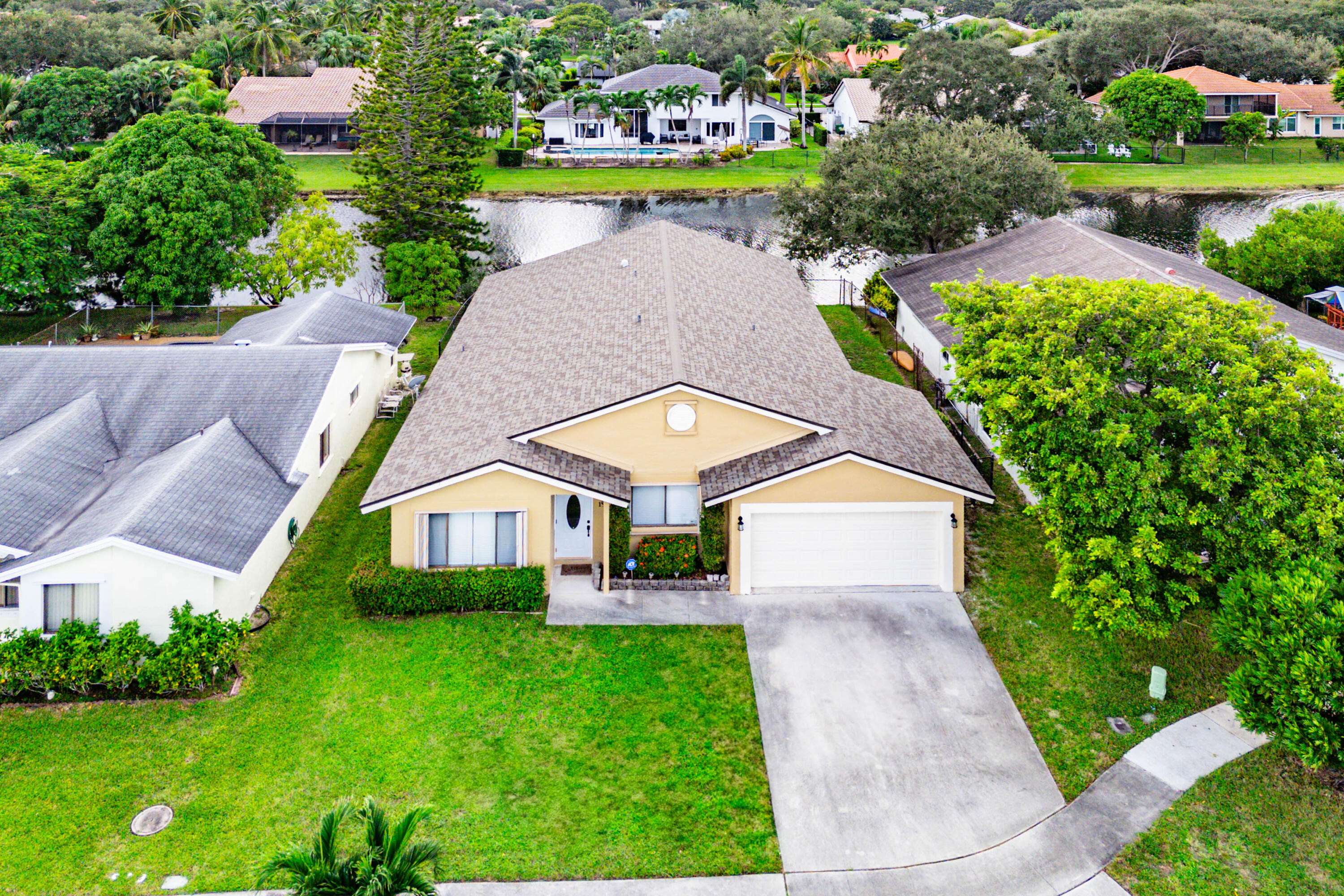 1531 Southwest 102nd Terrace Davie, FL 33324 - Photo 28 of 30 a aerial view of a house with a yard and potted plants