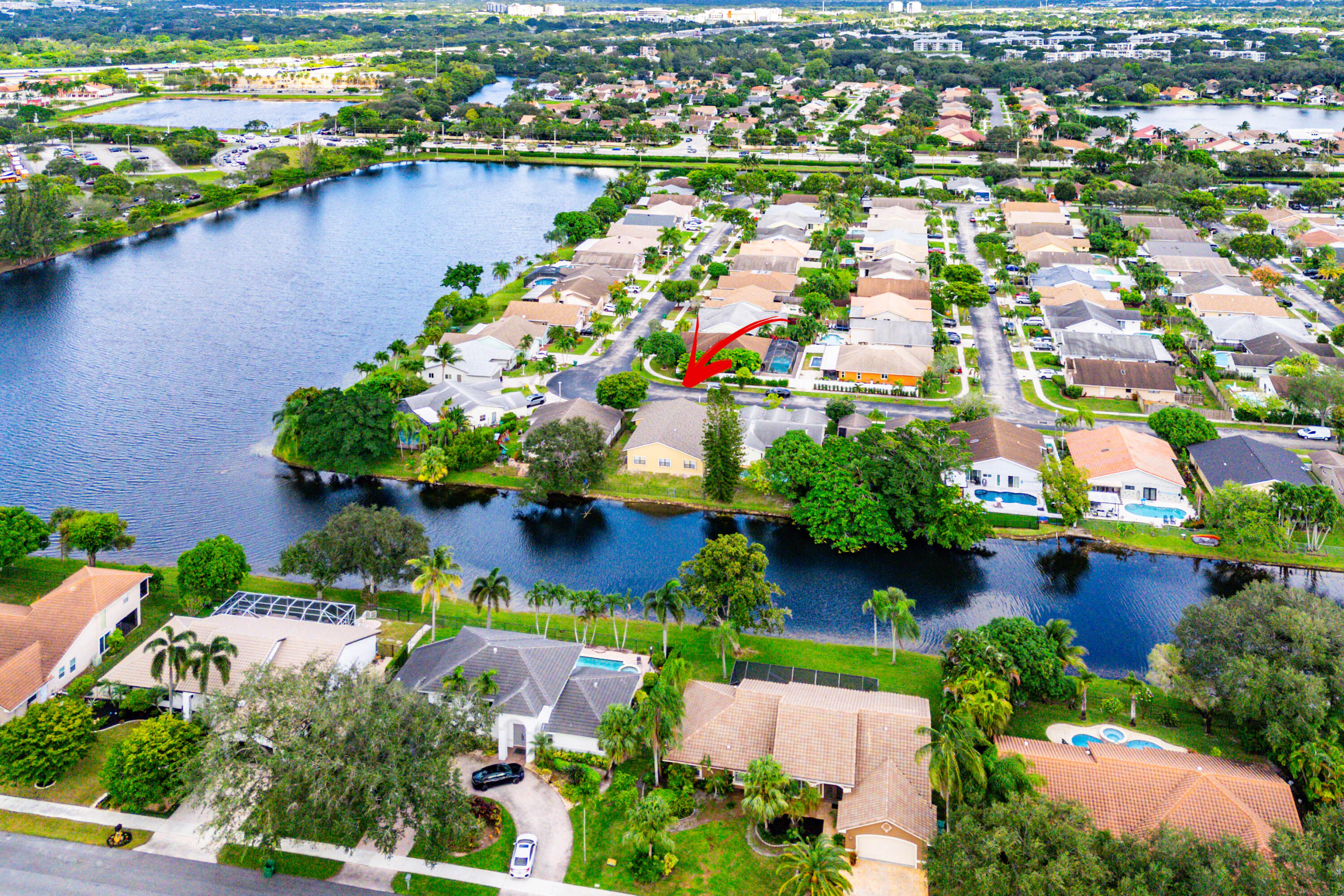 1531 Southwest 102nd Terrace Davie, FL 33324 - Photo 29 of 30 an aerial view of residential houses with outdoor space and lake view