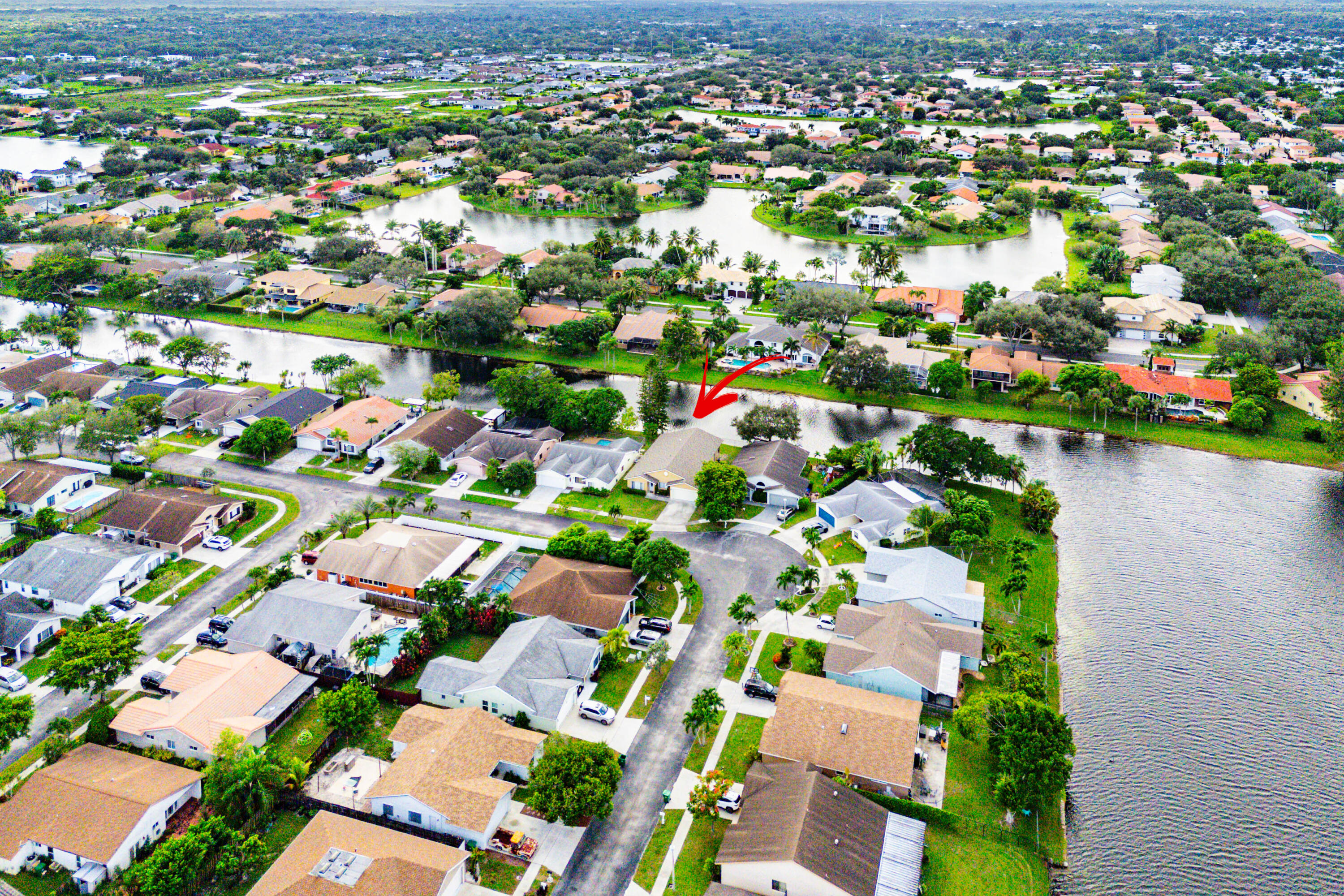 1531 Southwest 102nd Terrace Davie, FL 33324 - Photo 30 of 30 an aerial view of residential houses with outdoor space and trees