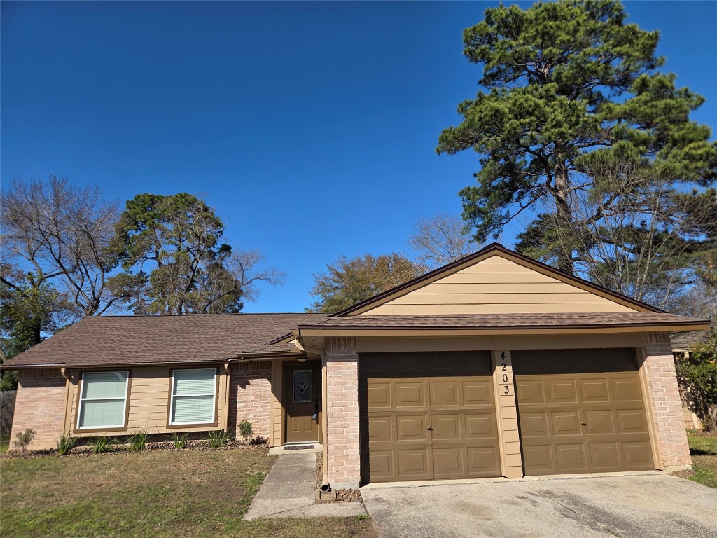 a front view of a house with a garage