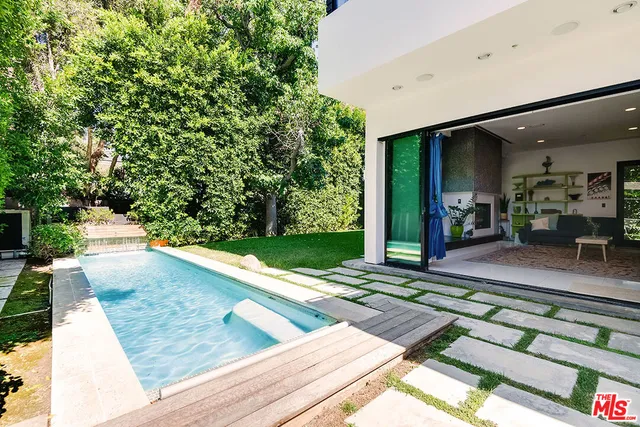a view of a lobby with furniture and garden