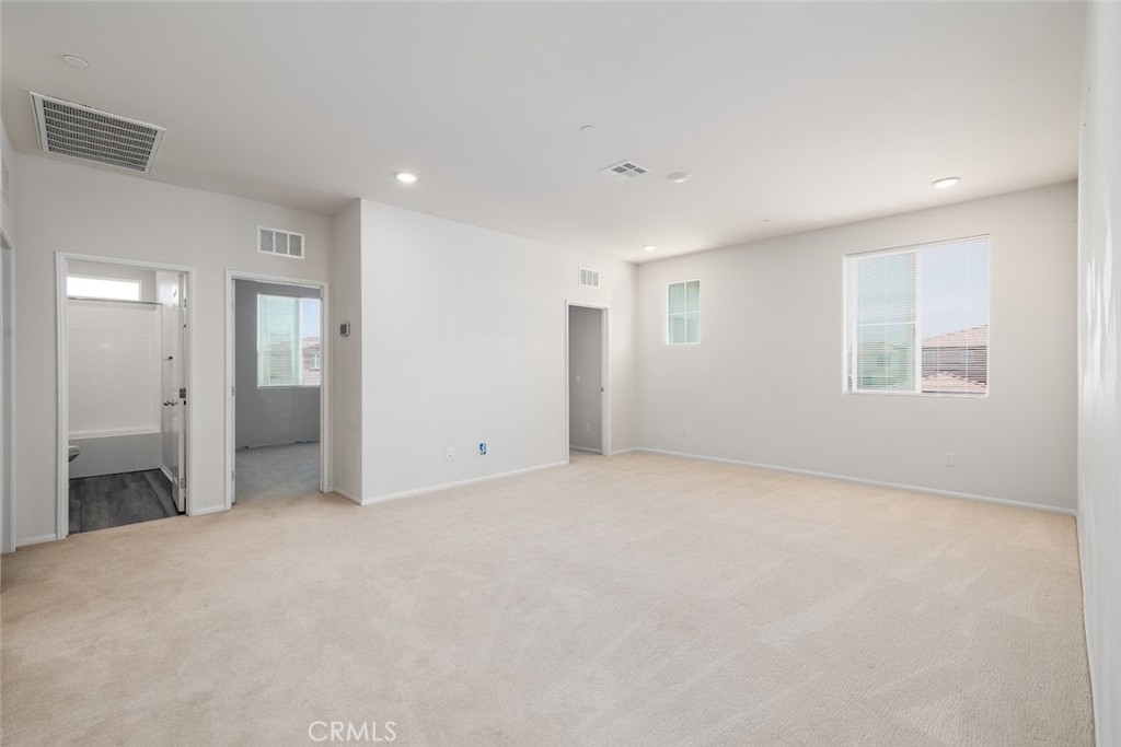 9667 Lasorda Court Riverside, CA 92503 - Photo 17 of 34 a view of an empty room with a window