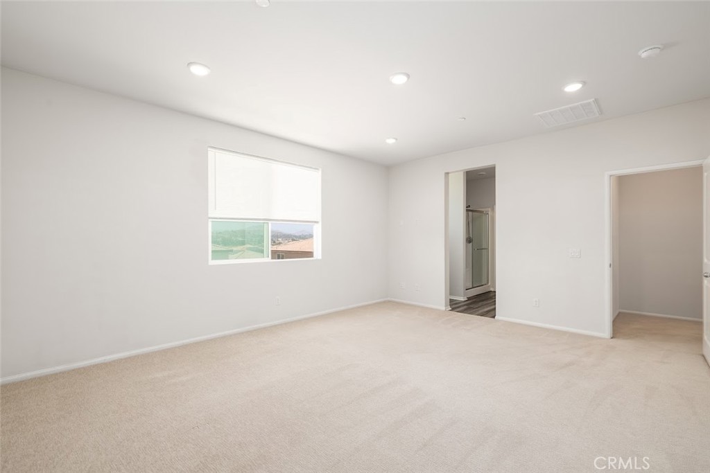 9667 Lasorda Court Riverside, CA 92503 - Photo 23 of 34 an empty room with windows
