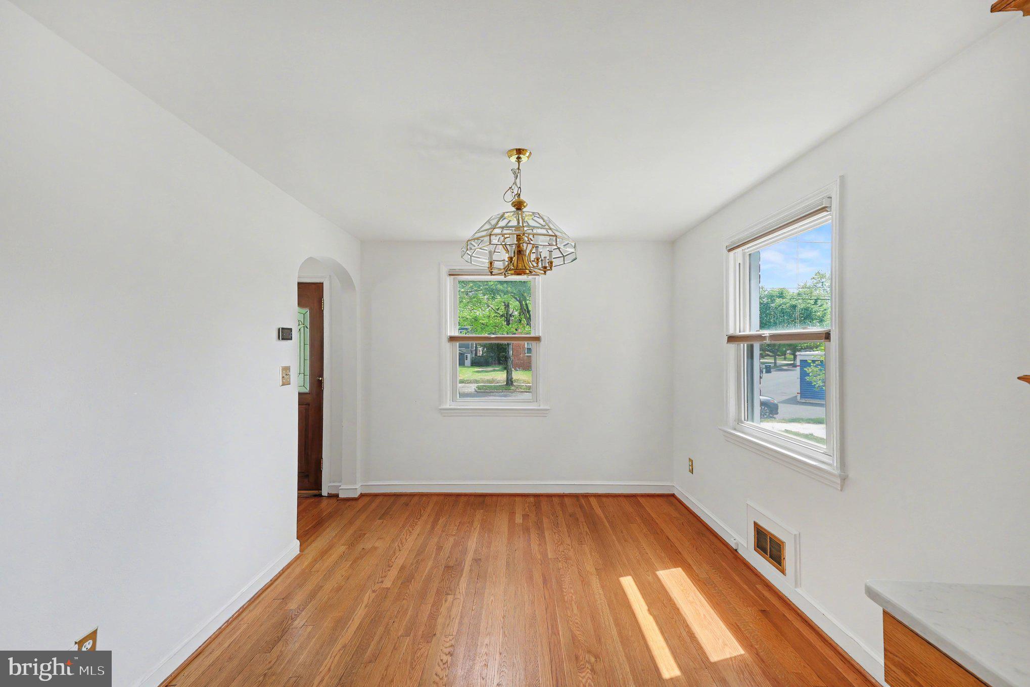 4504 20th Street Northeast Washington, DC 20018 - Photo 12 of 39 an empty room with windows