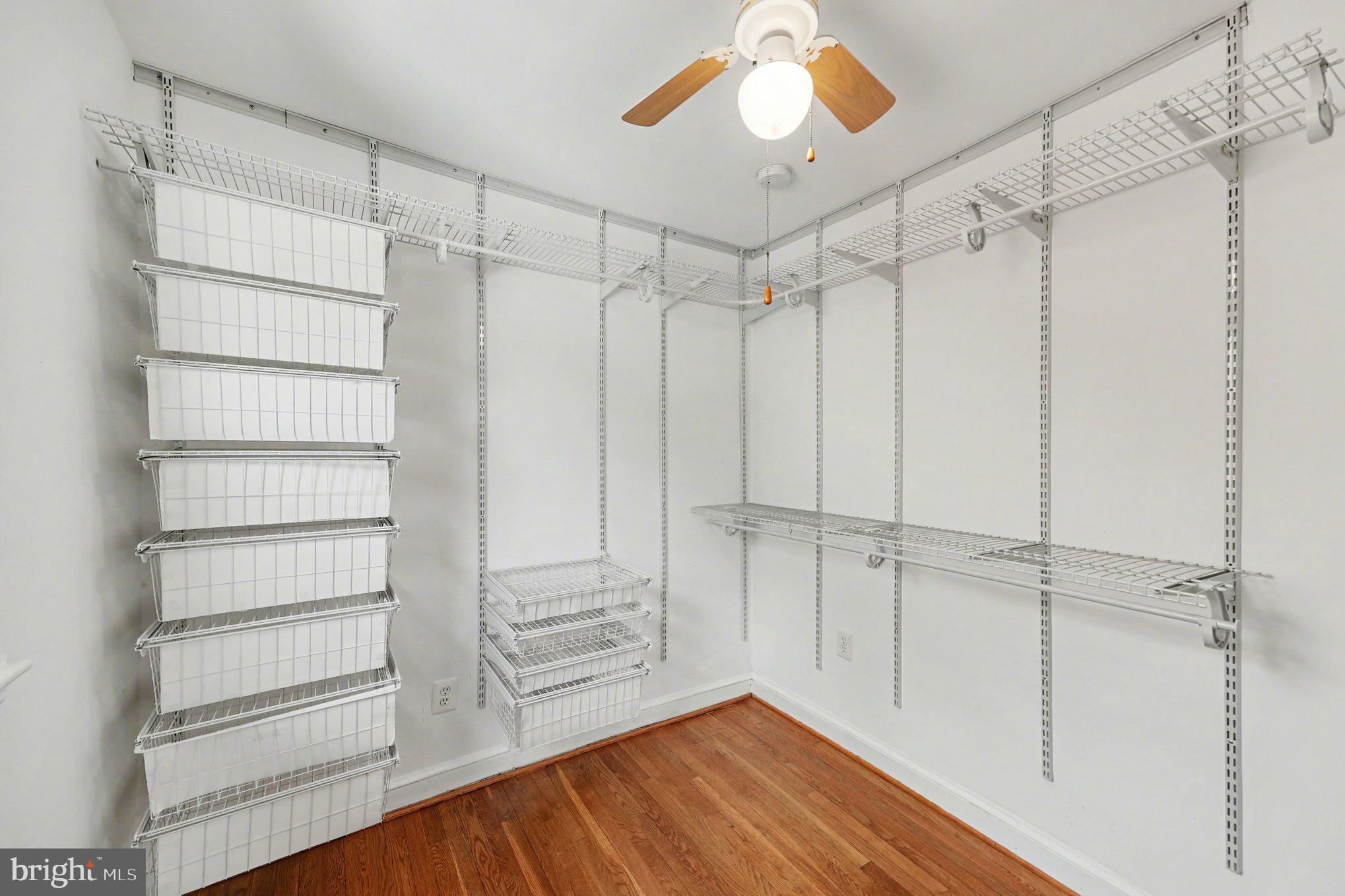 4504 20th Street Northeast Washington, DC 20018 - Photo 19 of 39 a view of a room with racks on the wall