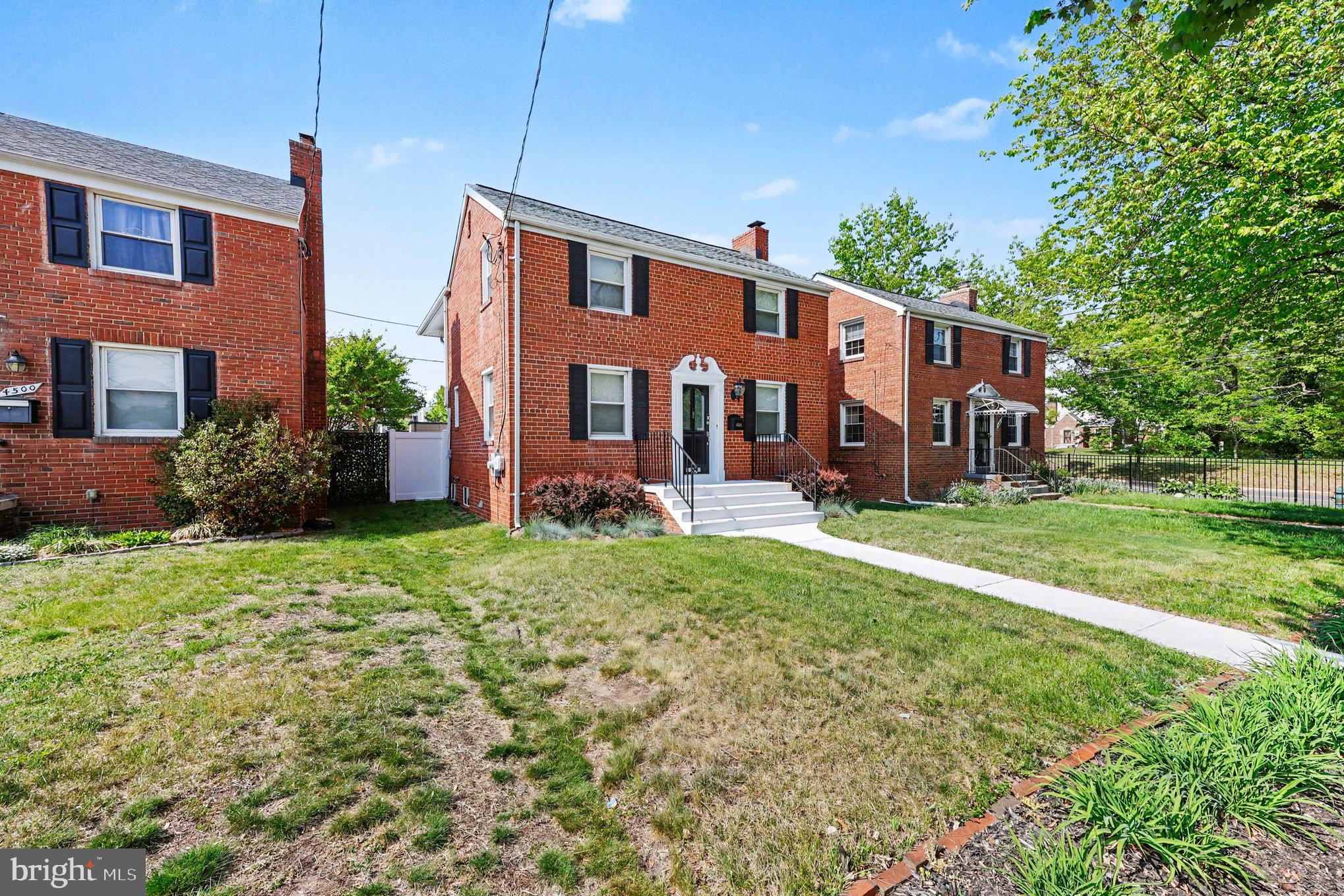 4504 20th Street Northeast Washington, DC 20018 - Photo 36 of 39 a front view of a house with garden