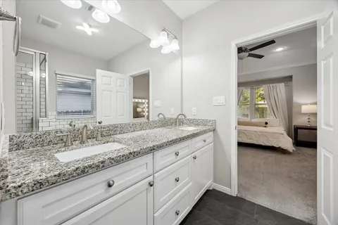 a bathroom with a bathtub and shower