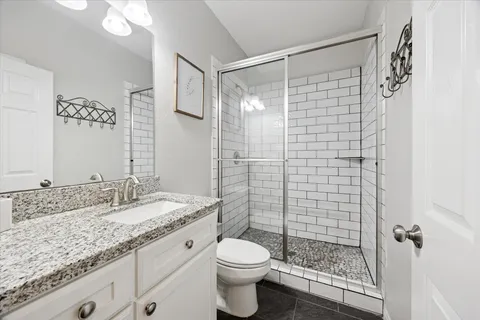 a utility room with cabinets washer and dryer