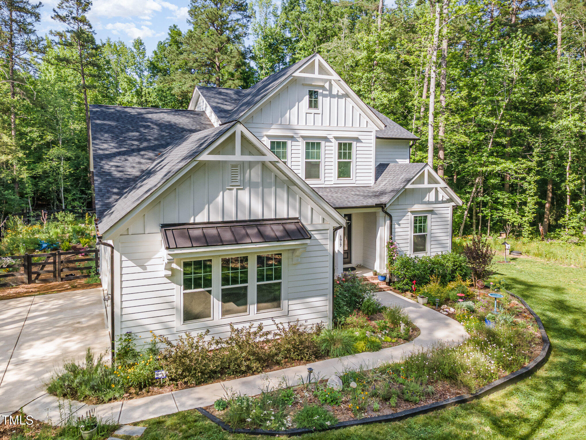 1017 Fortune Lane Mebane, NC 27302 - Photo 17 of 84 a front view of a house with a yard