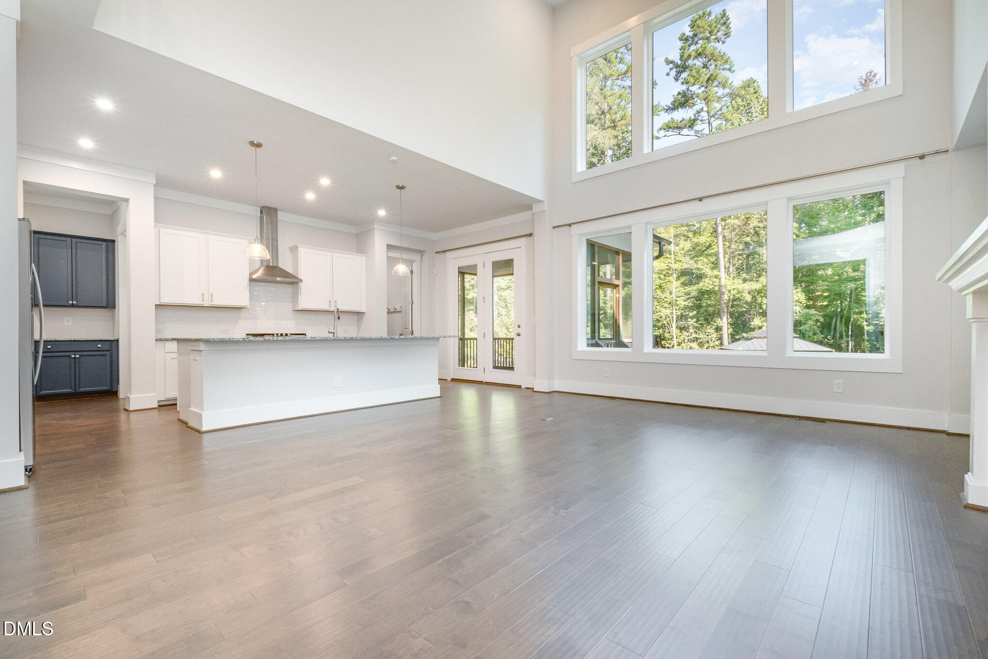 1017 Fortune Lane Mebane, NC 27302 - Photo 24 of 84 a view of an empty room with kitchen and a window