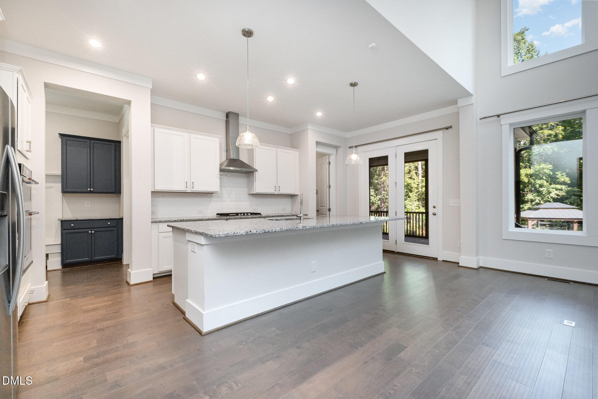 1017 Fortune Lane Mebane, NC 27302 - Photo 27 of 84 a large kitchen with stainless steel appliances granite countertop a large counter top a sink and a stove