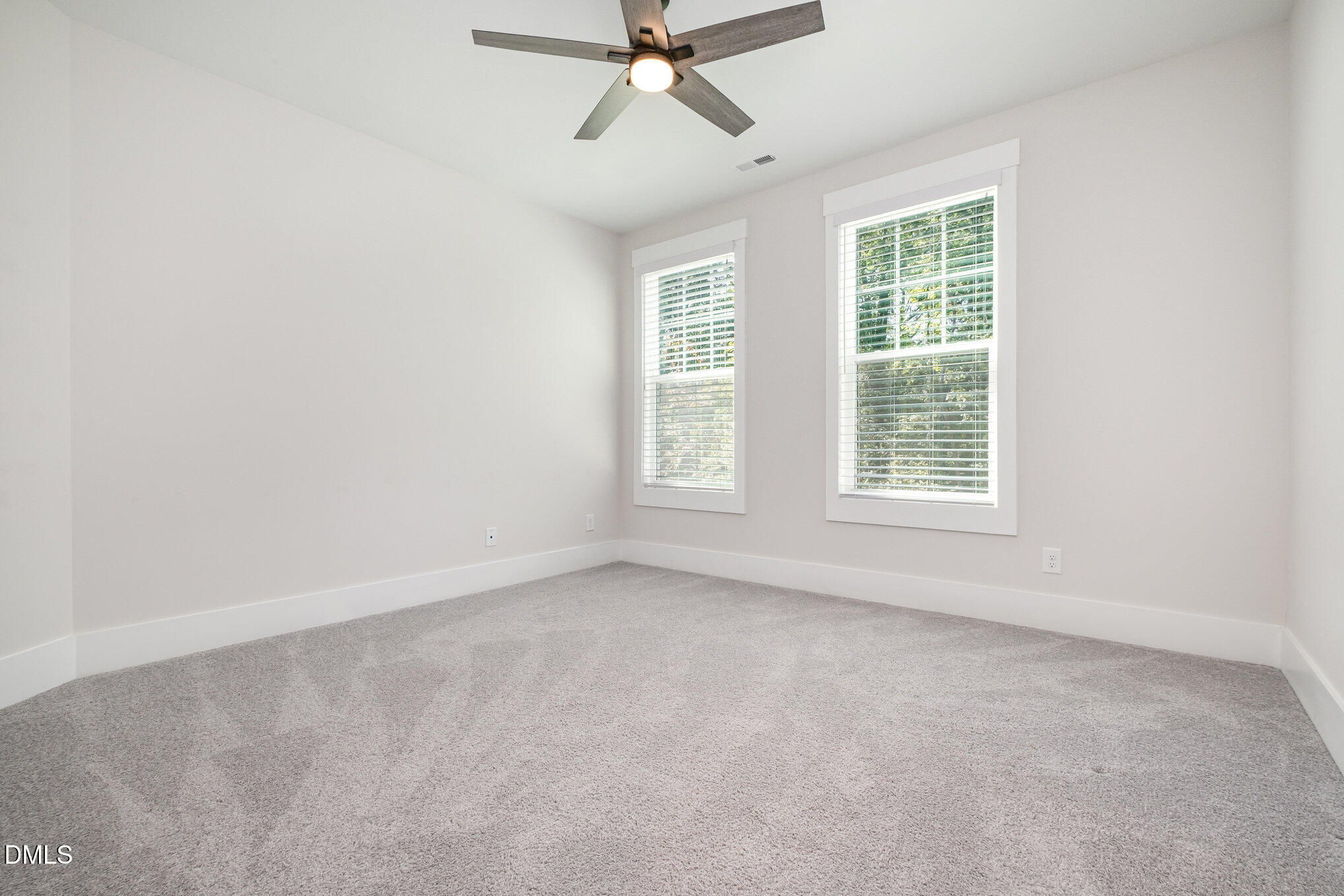 1017 Fortune Lane Mebane, NC 27302 - Photo 40 of 84 an empty room with a window and a fan
