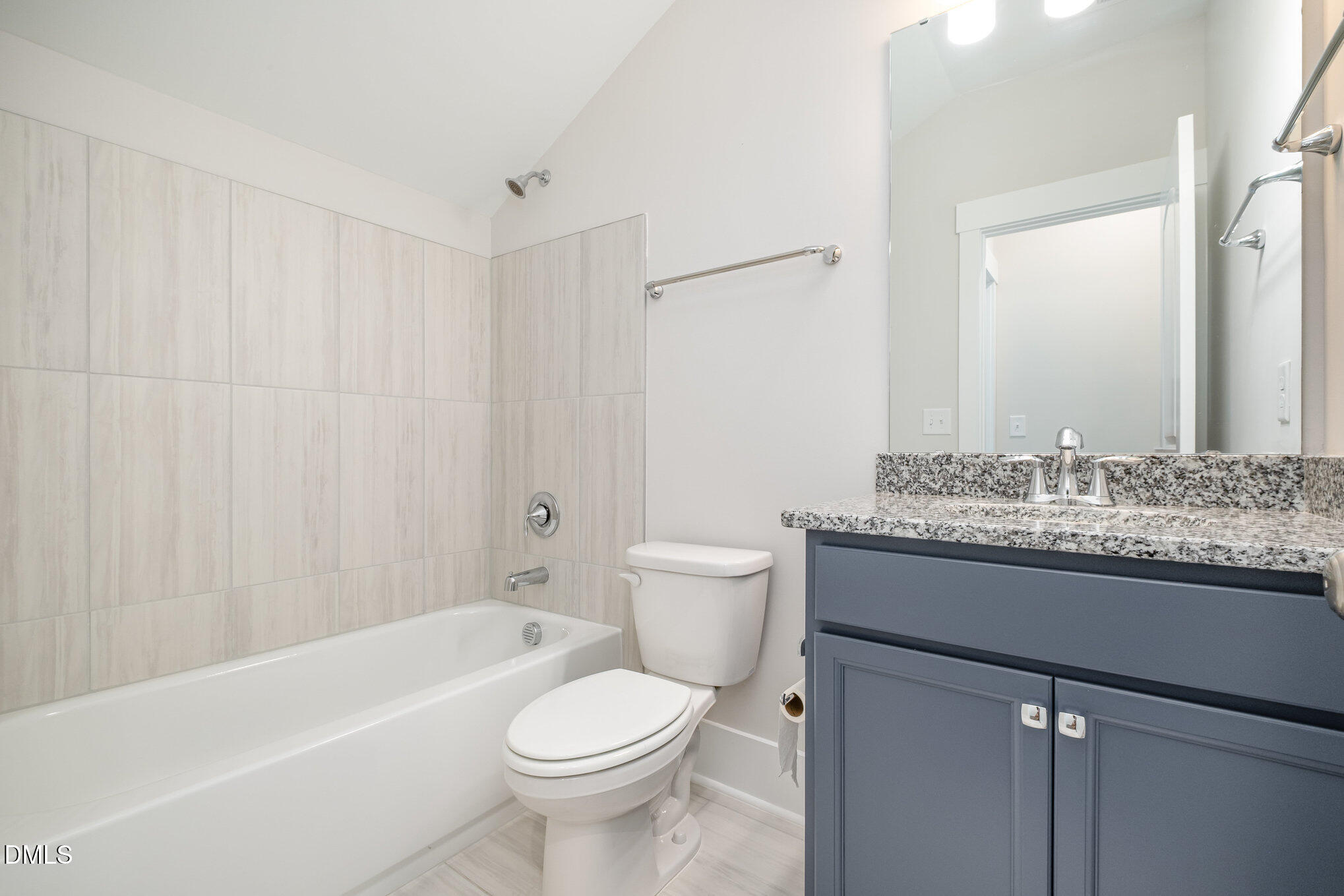 1017 Fortune Lane Mebane, NC 27302 - Photo 46 of 84 a bathroom with a granite countertop sink a toilet and bathtub