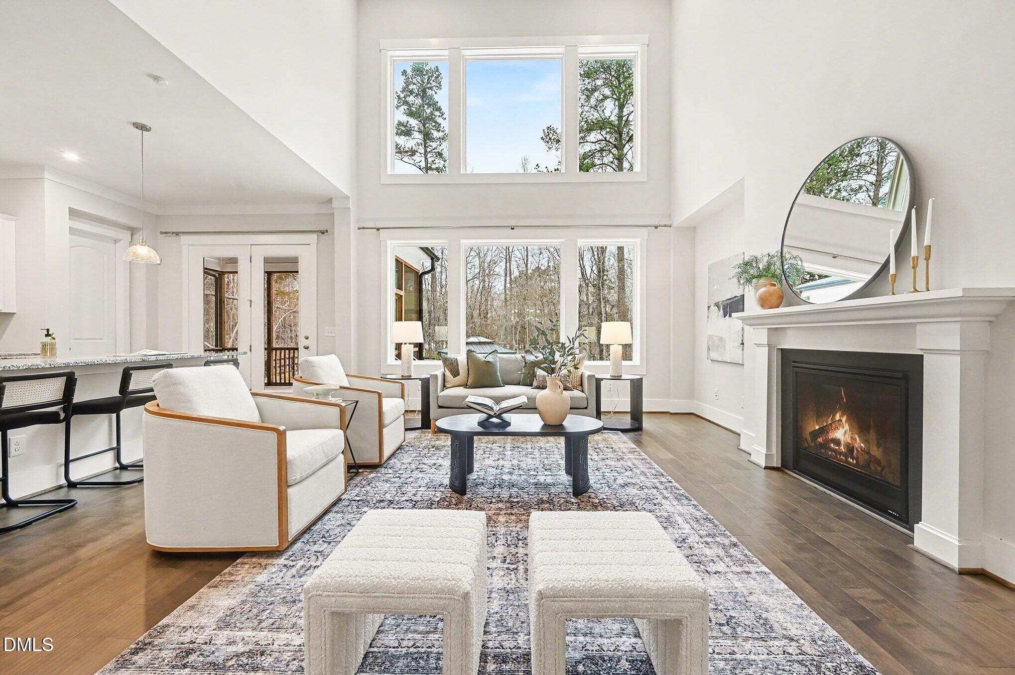 1017 Fortune Lane Mebane, NC 27302 - Photo 5 of 84 a living room with furniture a fireplace and a table