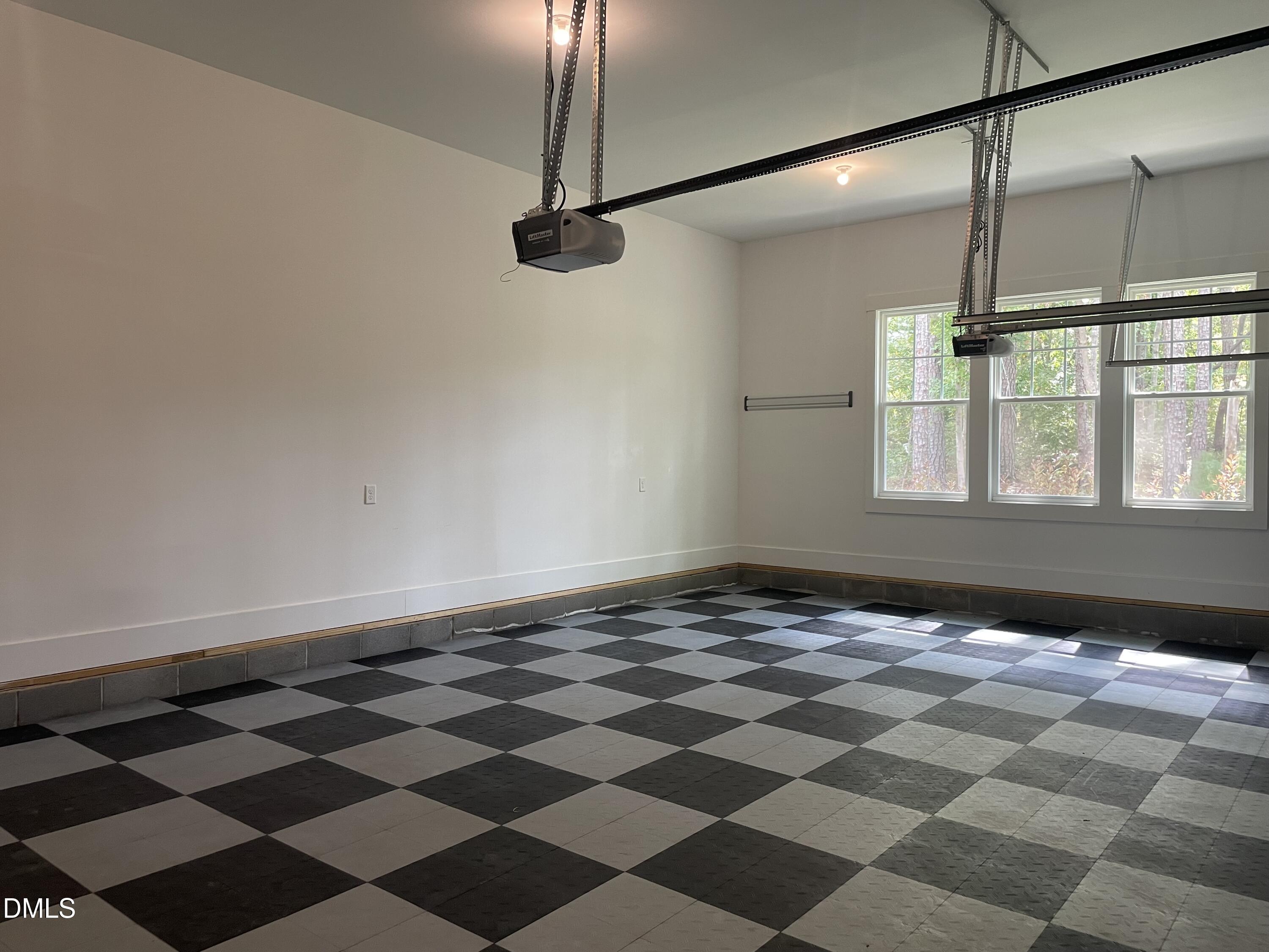 1017 Fortune Lane Mebane, NC 27302 - Photo 57 of 84 a view of a room with a black and white checkered floor