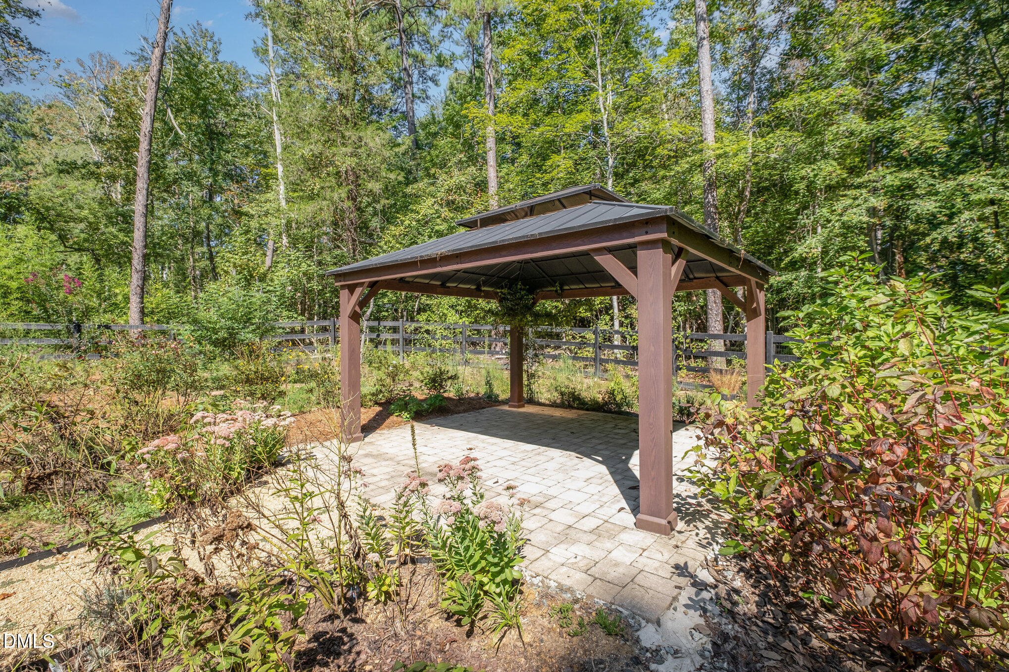 1017 Fortune Lane Mebane, NC 27302 - Photo 61 of 84 a view of backyard with plants and large trees