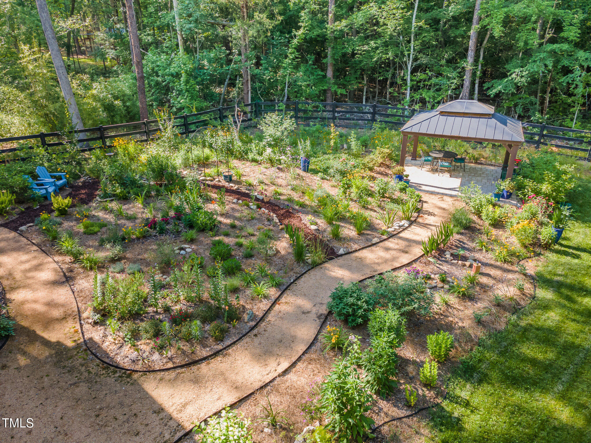 1017 Fortune Lane Mebane, NC 27302 - Photo 64 of 84 a view of a lake with a house and a yard